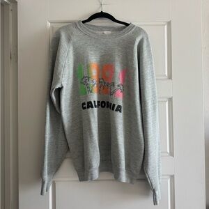 Vintage Gray Sweatshirt with Vibrant Print